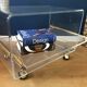 Altuglass roller TV table/furniture by David Lange with sliding tray