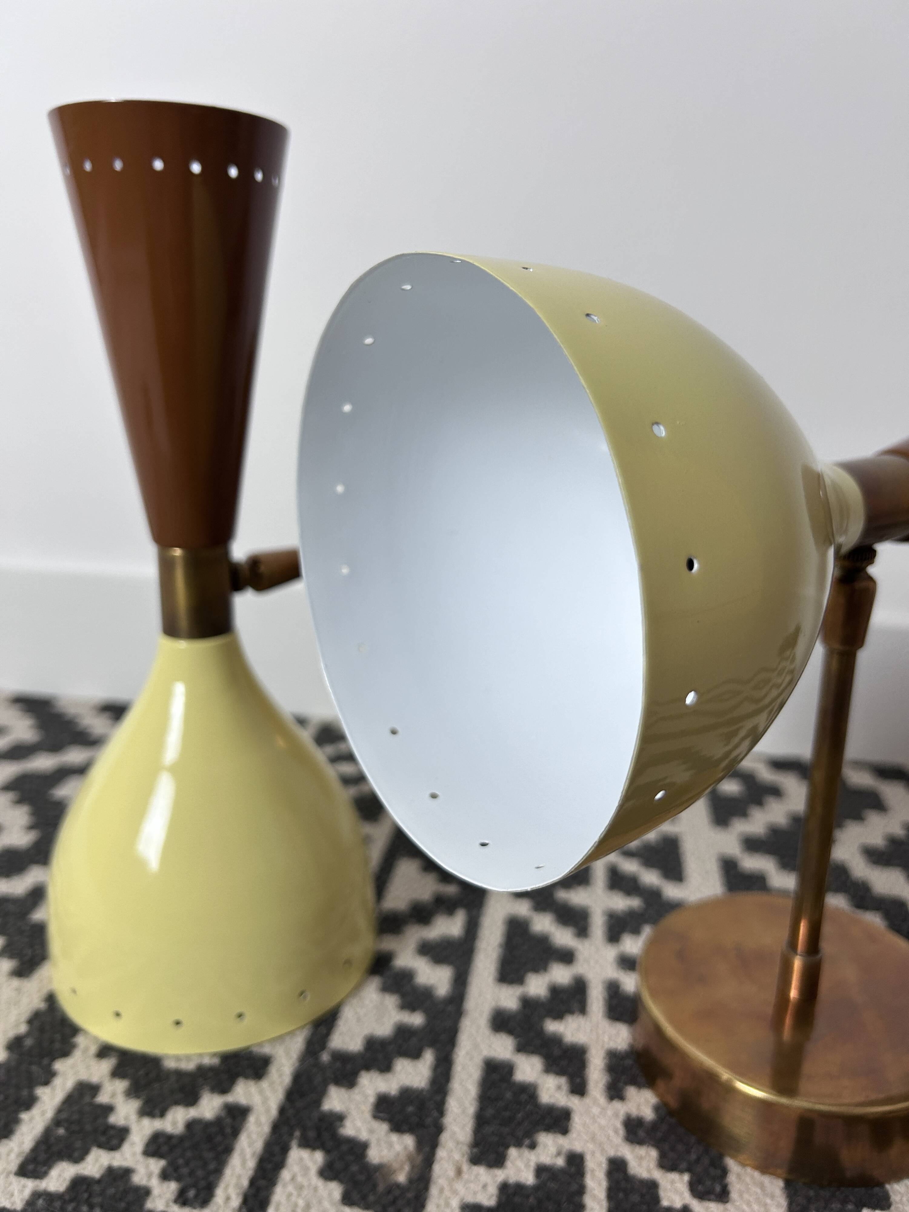 Pair of metal diabolo wall lights