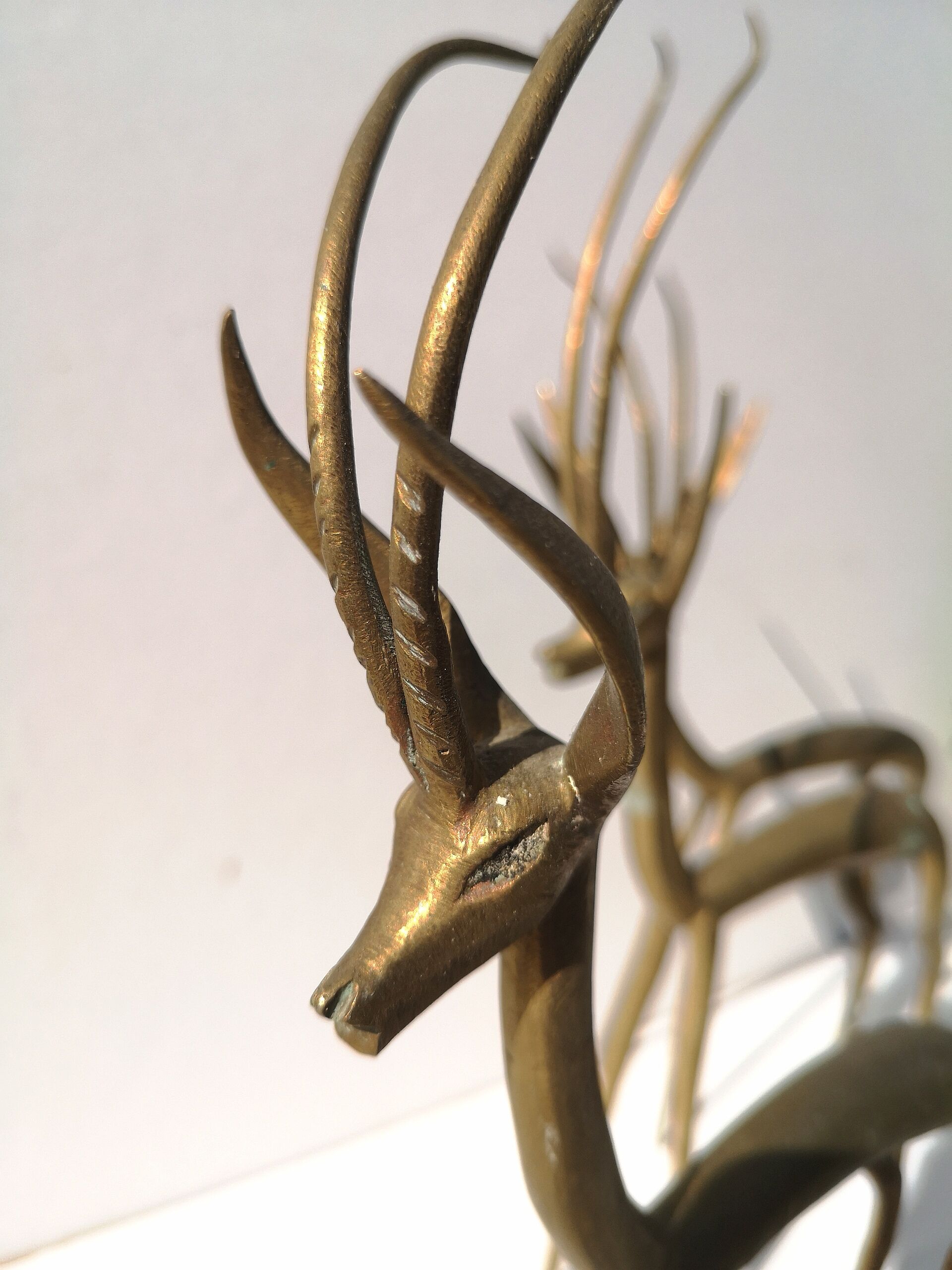 Trio of gazelles / solid brass antelopes