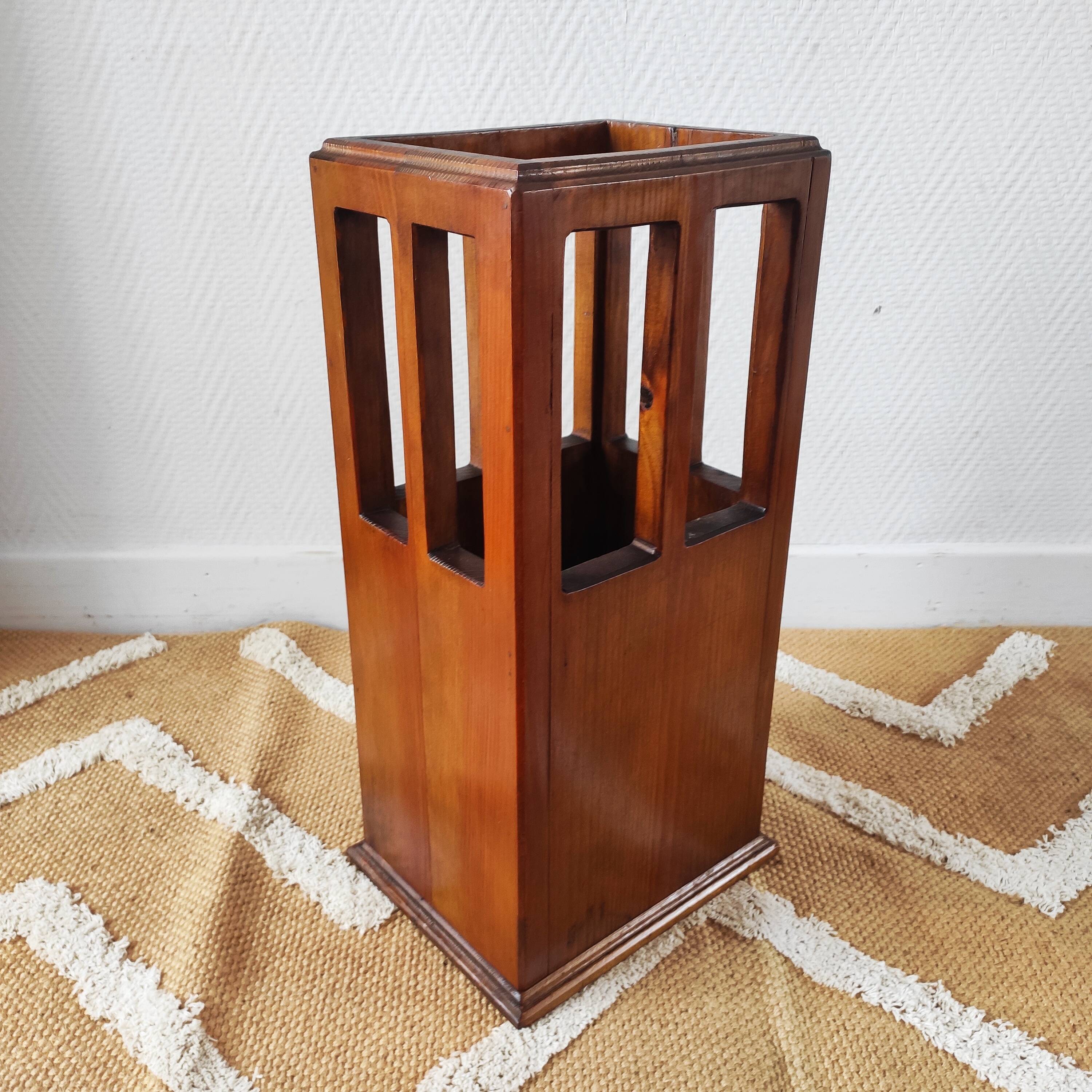 Vintage brutalist umbrella stand made of solid wood.