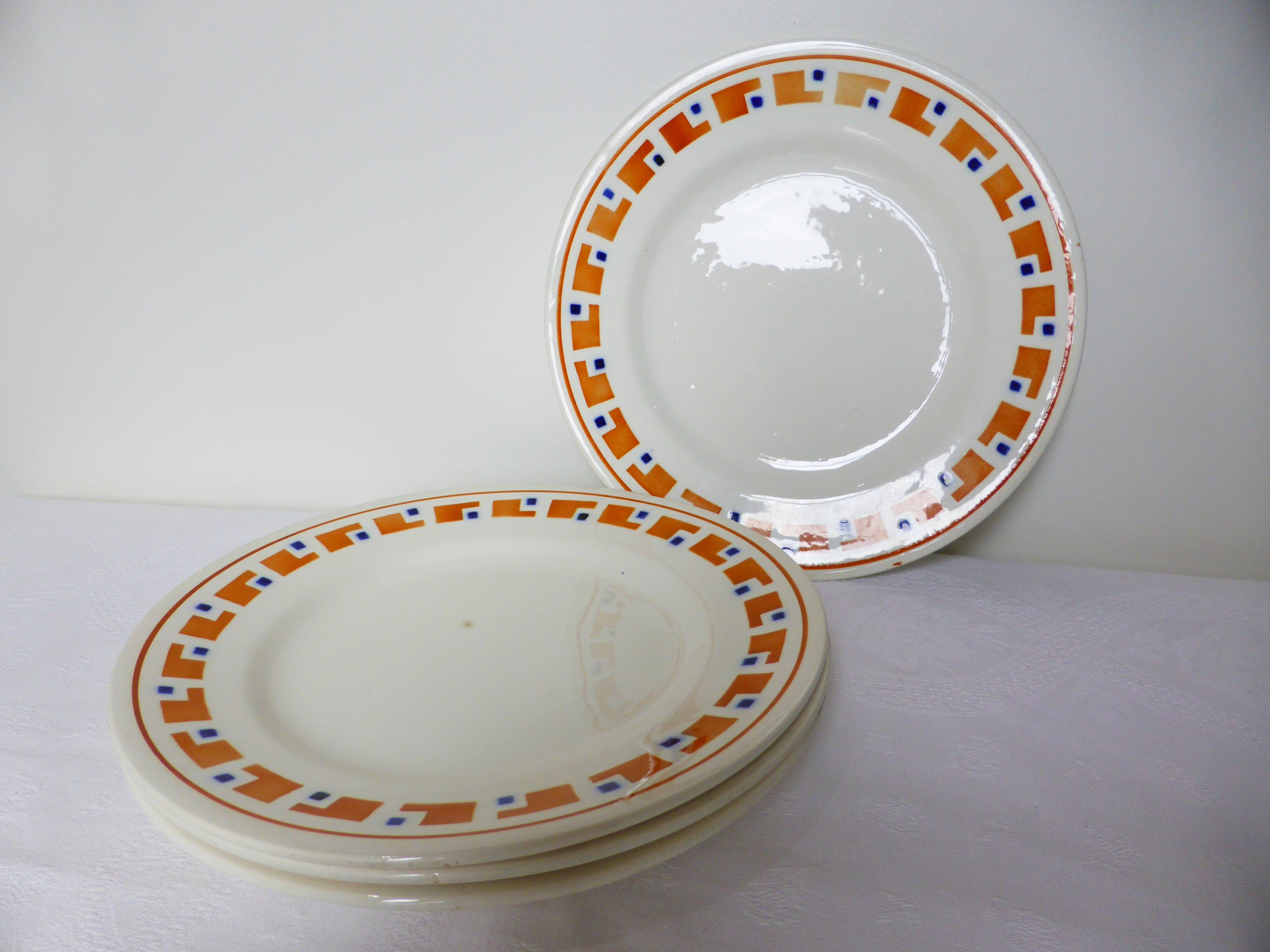 4 flat plates in iron earth from Salins, Lucette model 210809