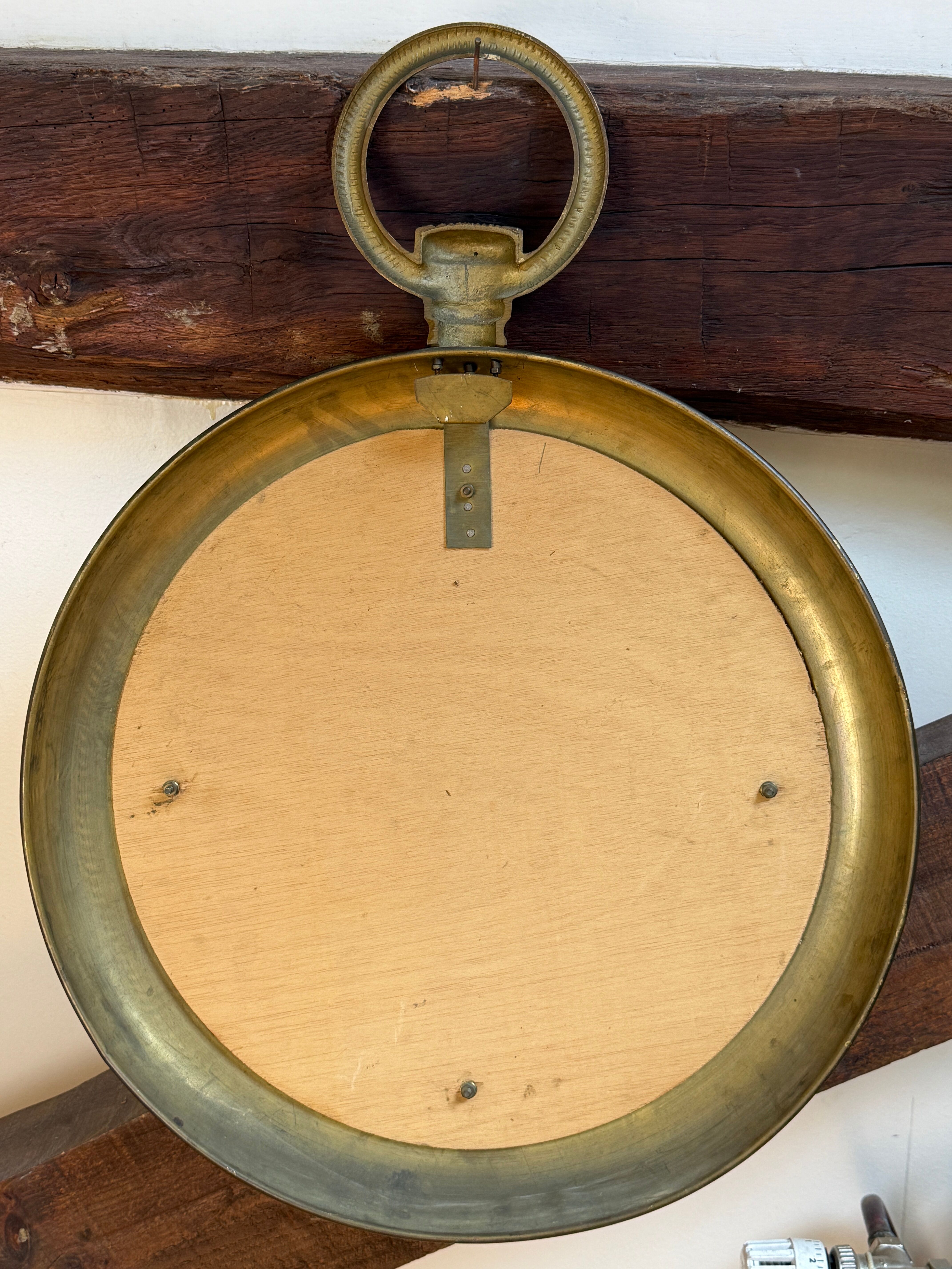 Large brass mirror in the style of Piero Fornasetti, 60 Italy.