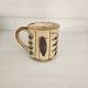 Set of 4 ceramic mugs, glazed stoneware, assorted vintage designs.