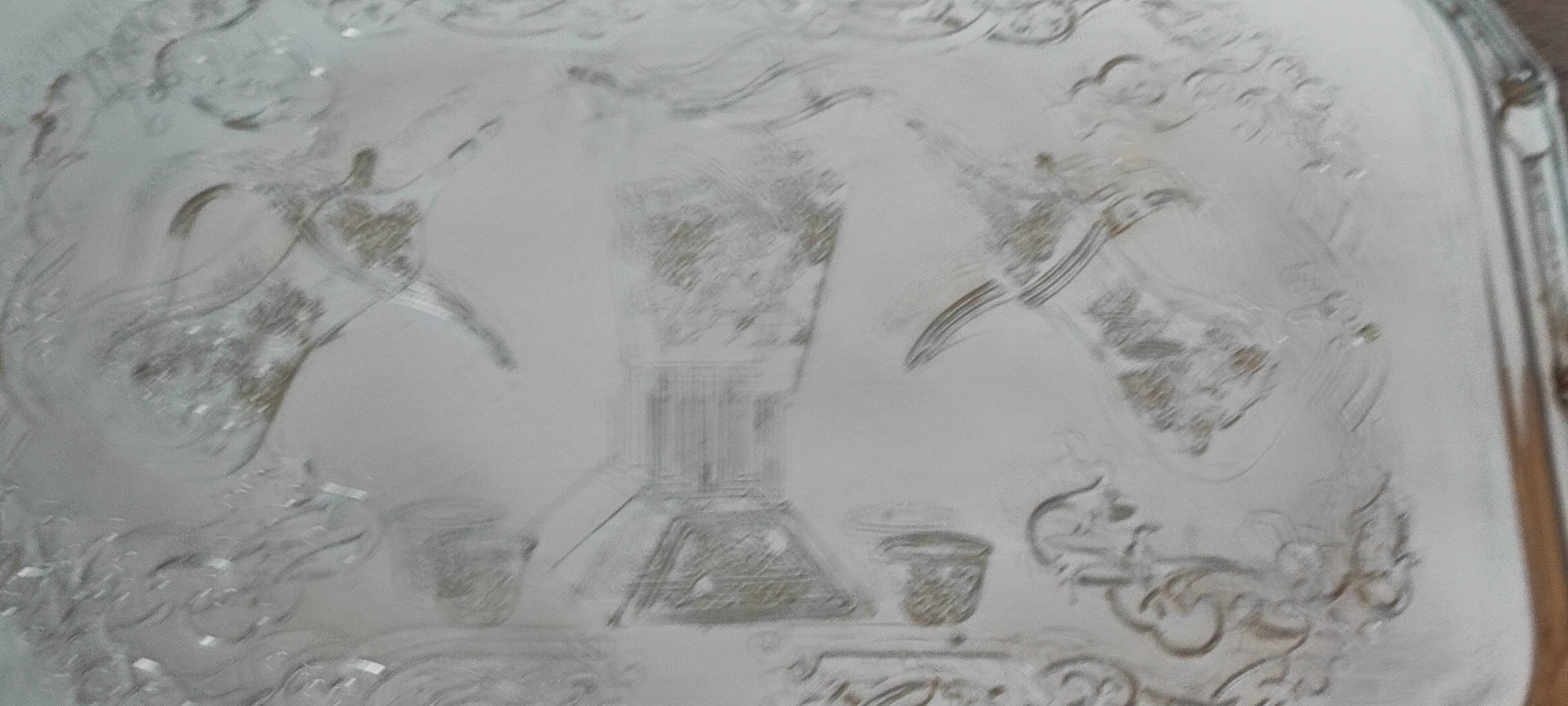 Rectangular silver-plated metal dish with an 80s-style design.