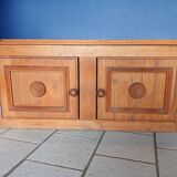 Low oak furniture in the Dudouyt style, with a sculpted front.