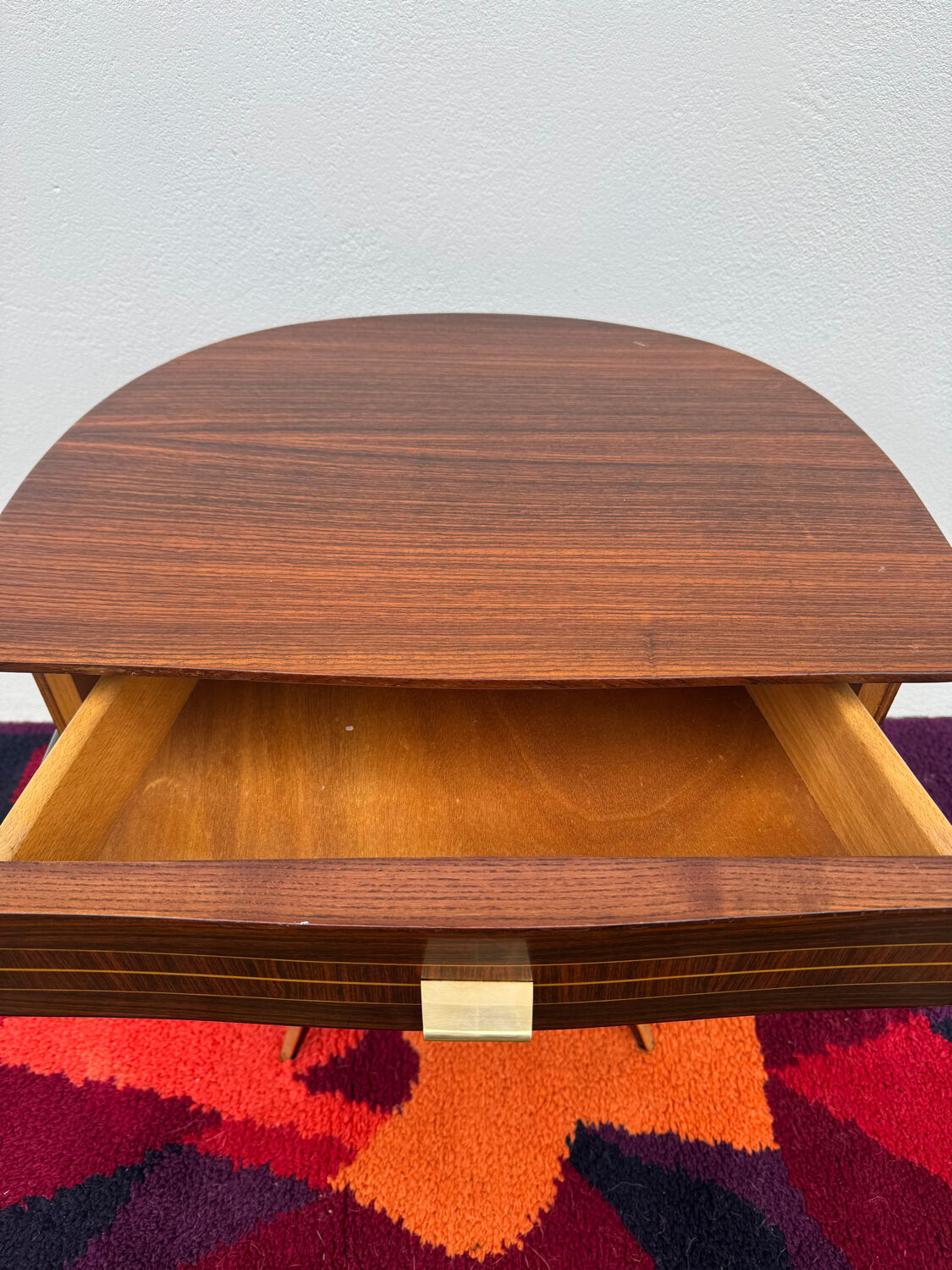 1950s half-moon tripod bedside table