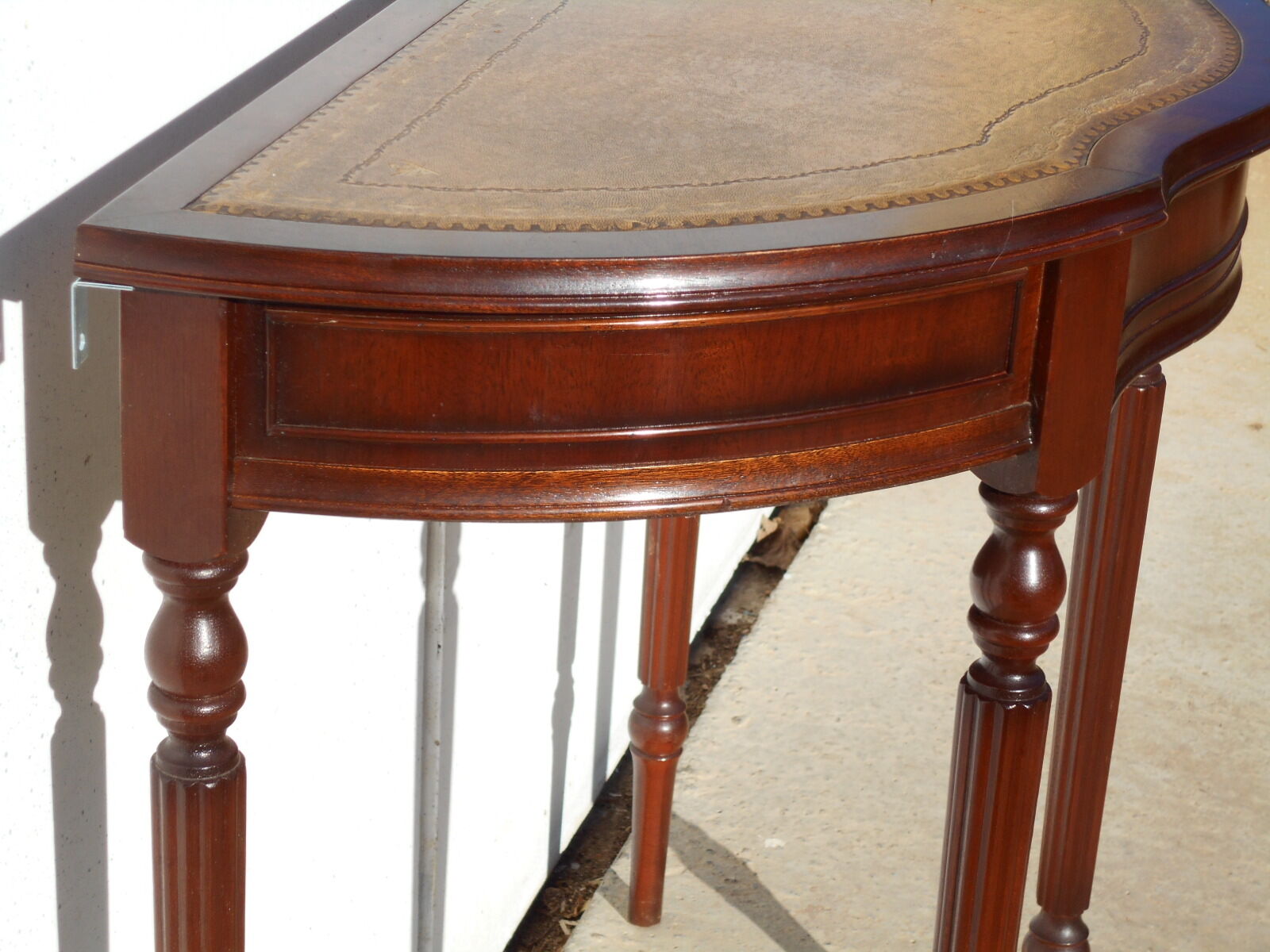 English-style half-moon console, mahogany and leather