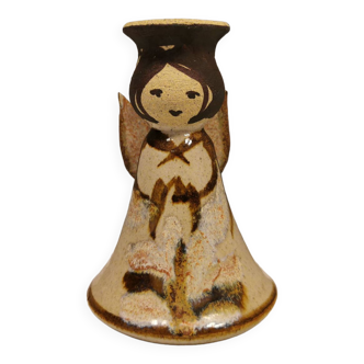 Ceramic candle holder, in the shape of an angel, signed at the bottom.