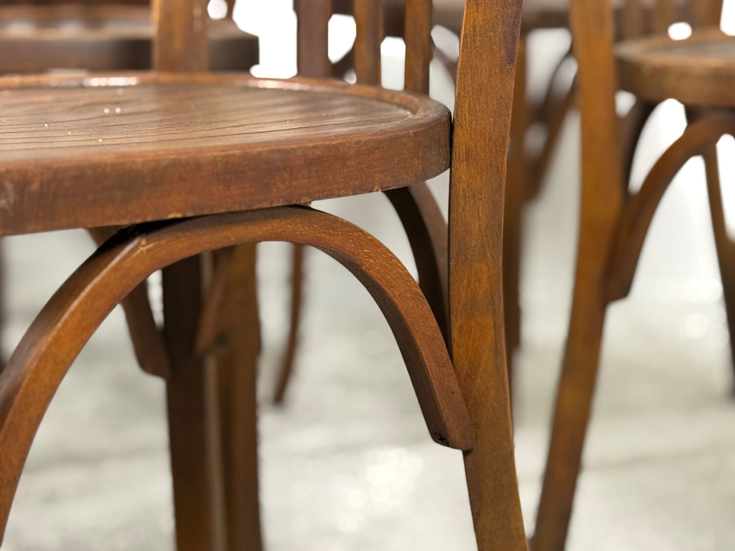 Set of 17 vintage bistro chairs in curved wood — striped seat, be