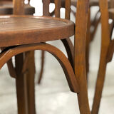 Set of 17 vintage bistro chairs in curved wood — striped seat, be