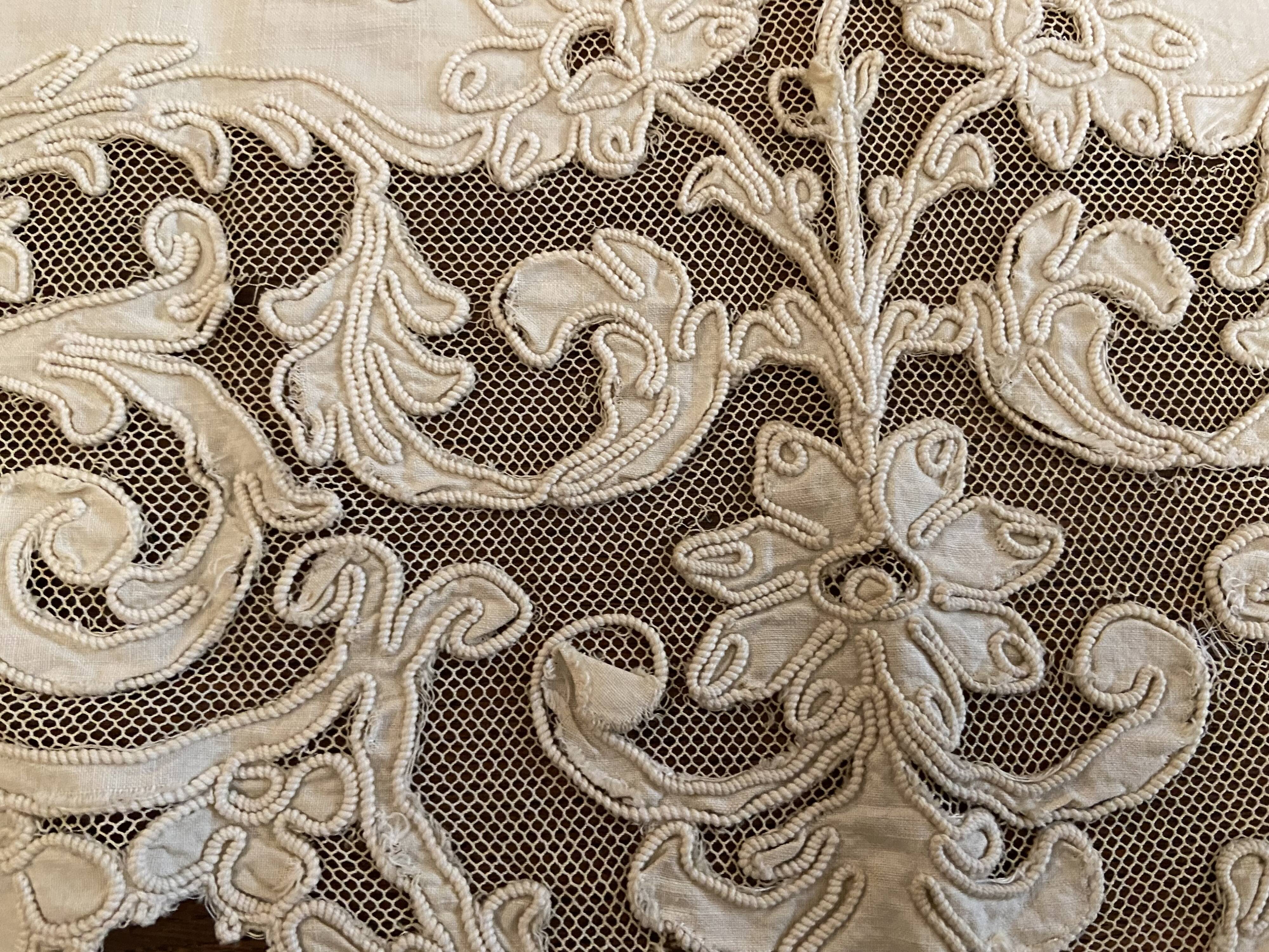 Sheet with embroidered decoration and openwork with cornucopia late nineteenth