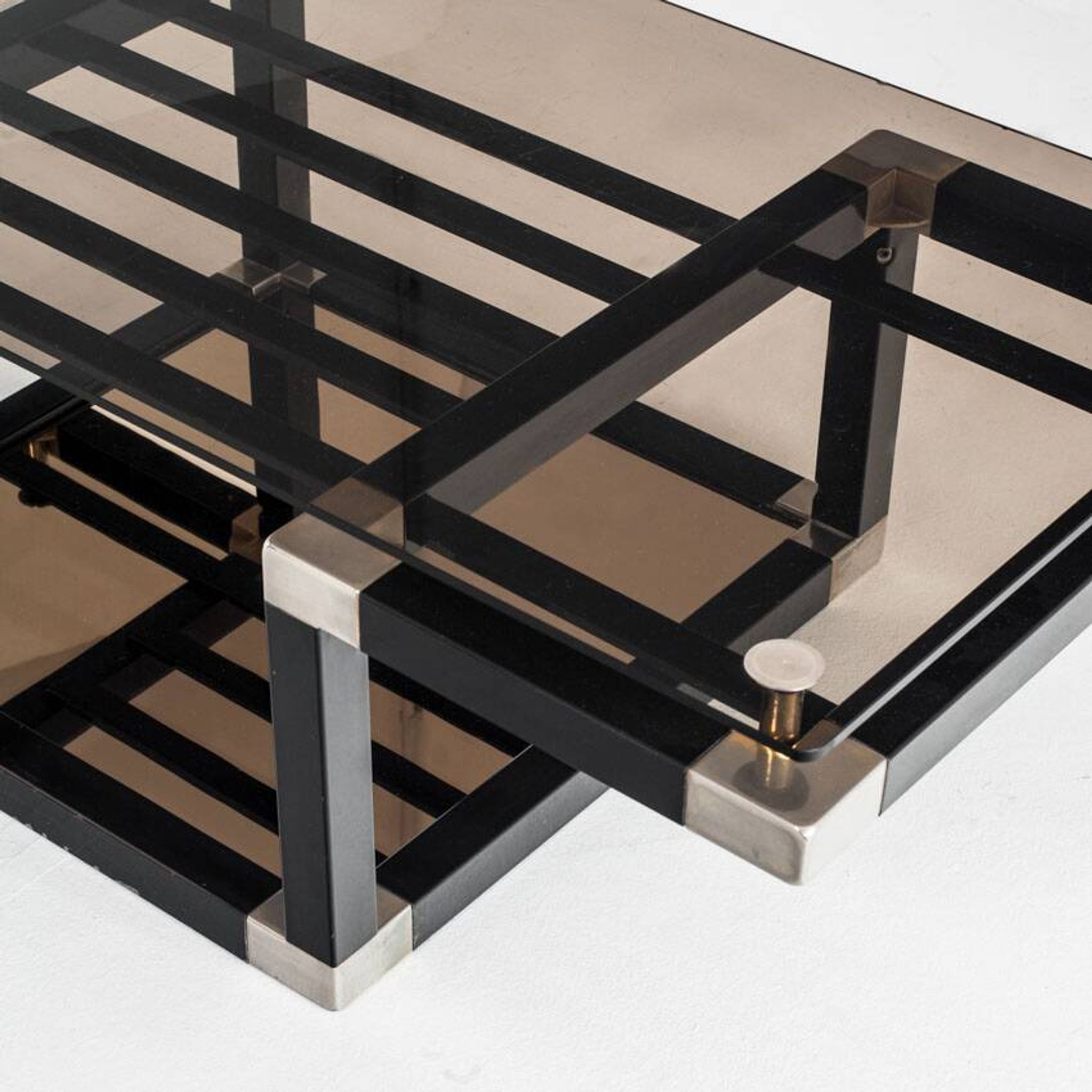 Coffee table attributed to Romeo Rega. Iron and smoked glass – France, 1980s.