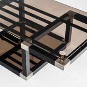 Coffee table attributed to Romeo Rega. Iron and smoked glass – France, 1980s.