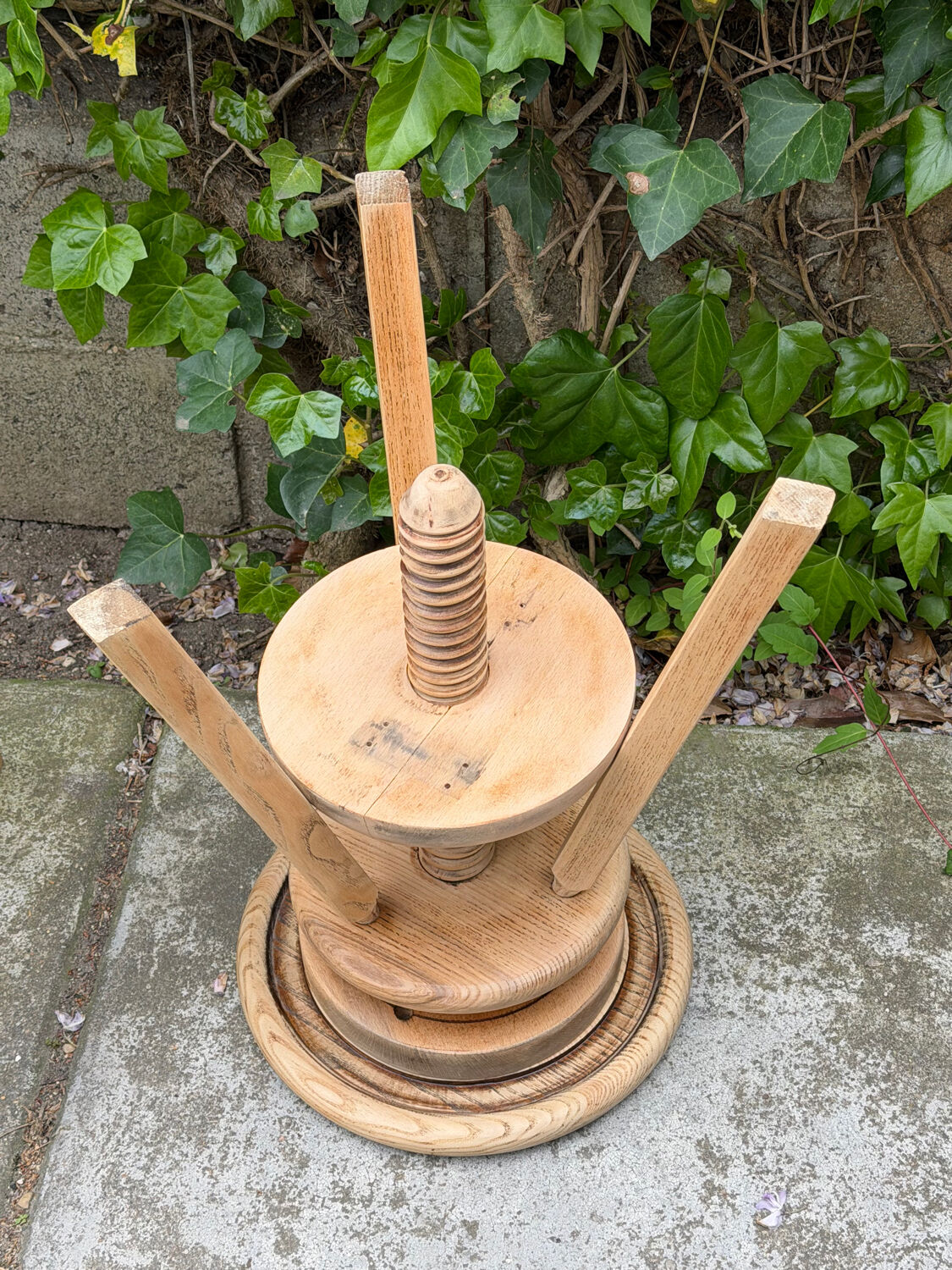 1950s solid oak tripod workshop stool with a screw mechanism.