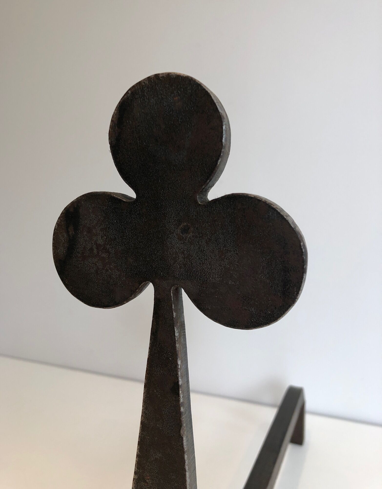 Pair of wrought steel and iron chenets with clover decorations 1950