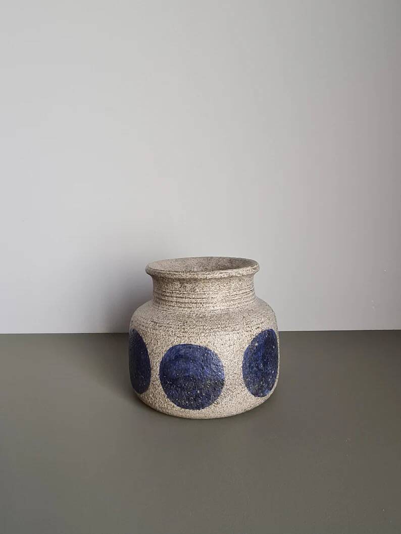 Mid-century modern stoneware vase with cobalt blue dots.