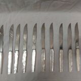 12 mother-of-pearl knives, early mid-20th century