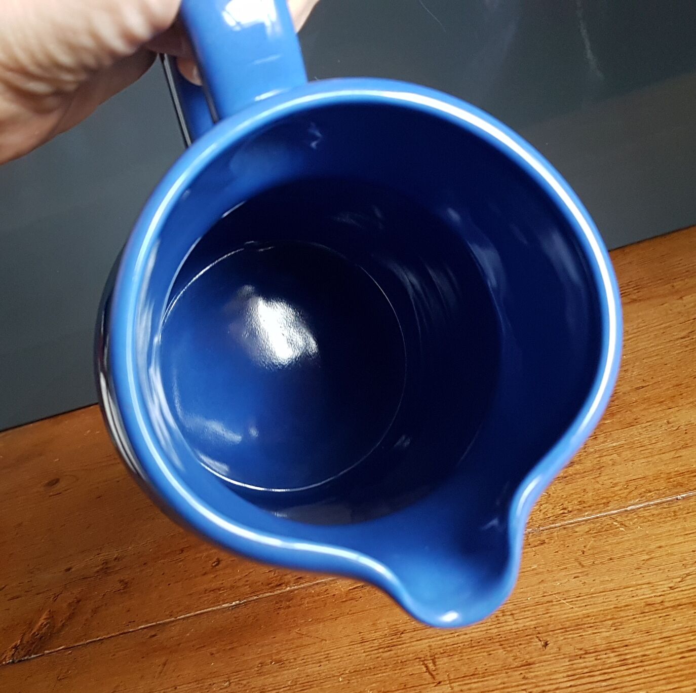 Blue ceramic pitcher