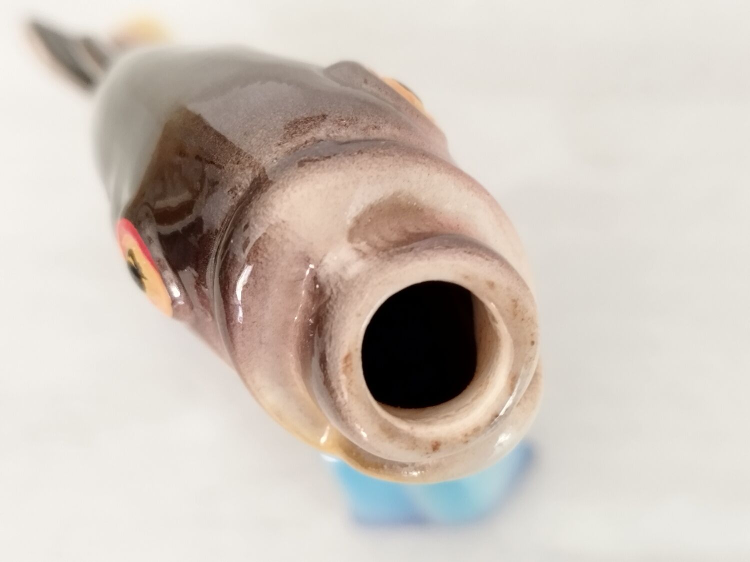 Vintage earthenware fish bottle