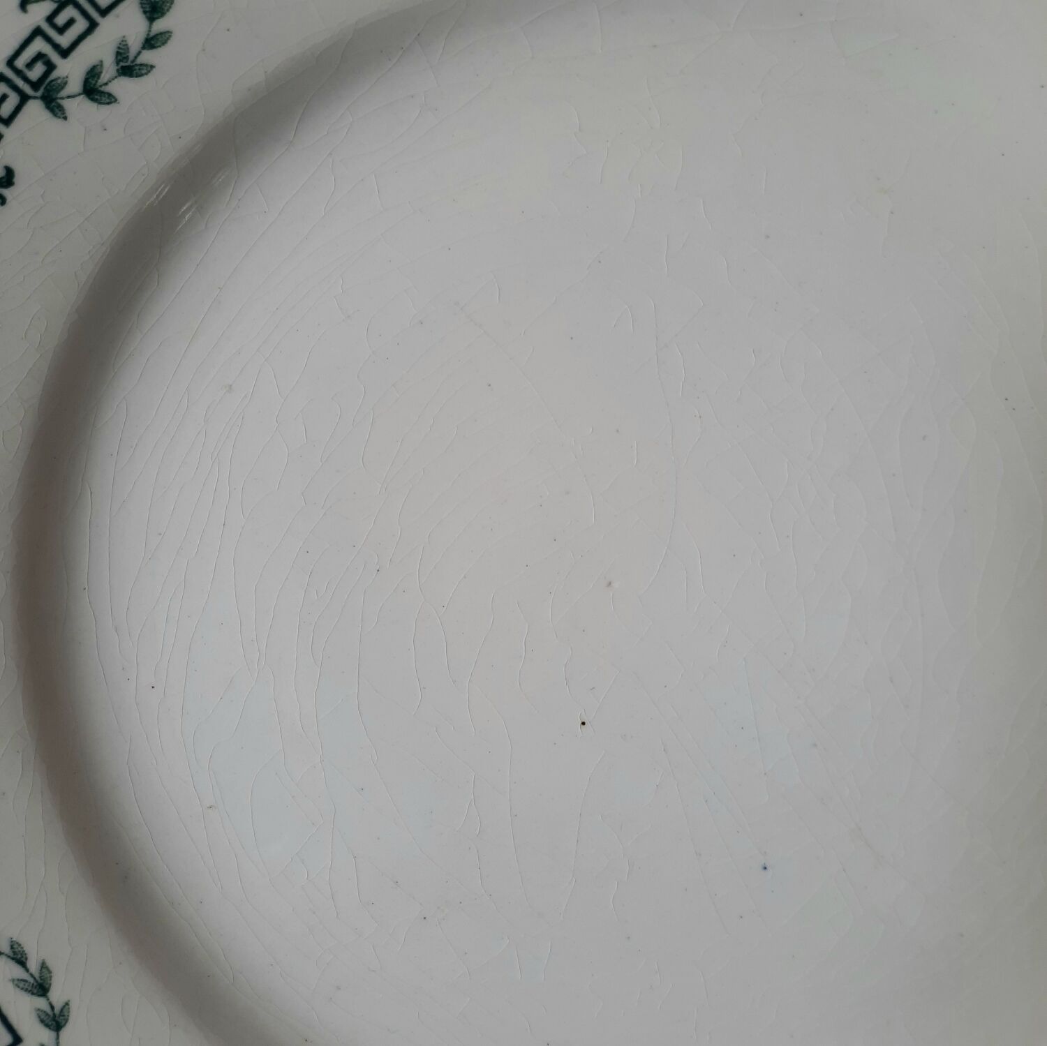 Old dessert plates mismatched in iron earth