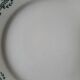 Old dessert plates mismatched in iron earth