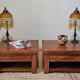 Pair of handcrafted walnut bedside tables from the 20th century.