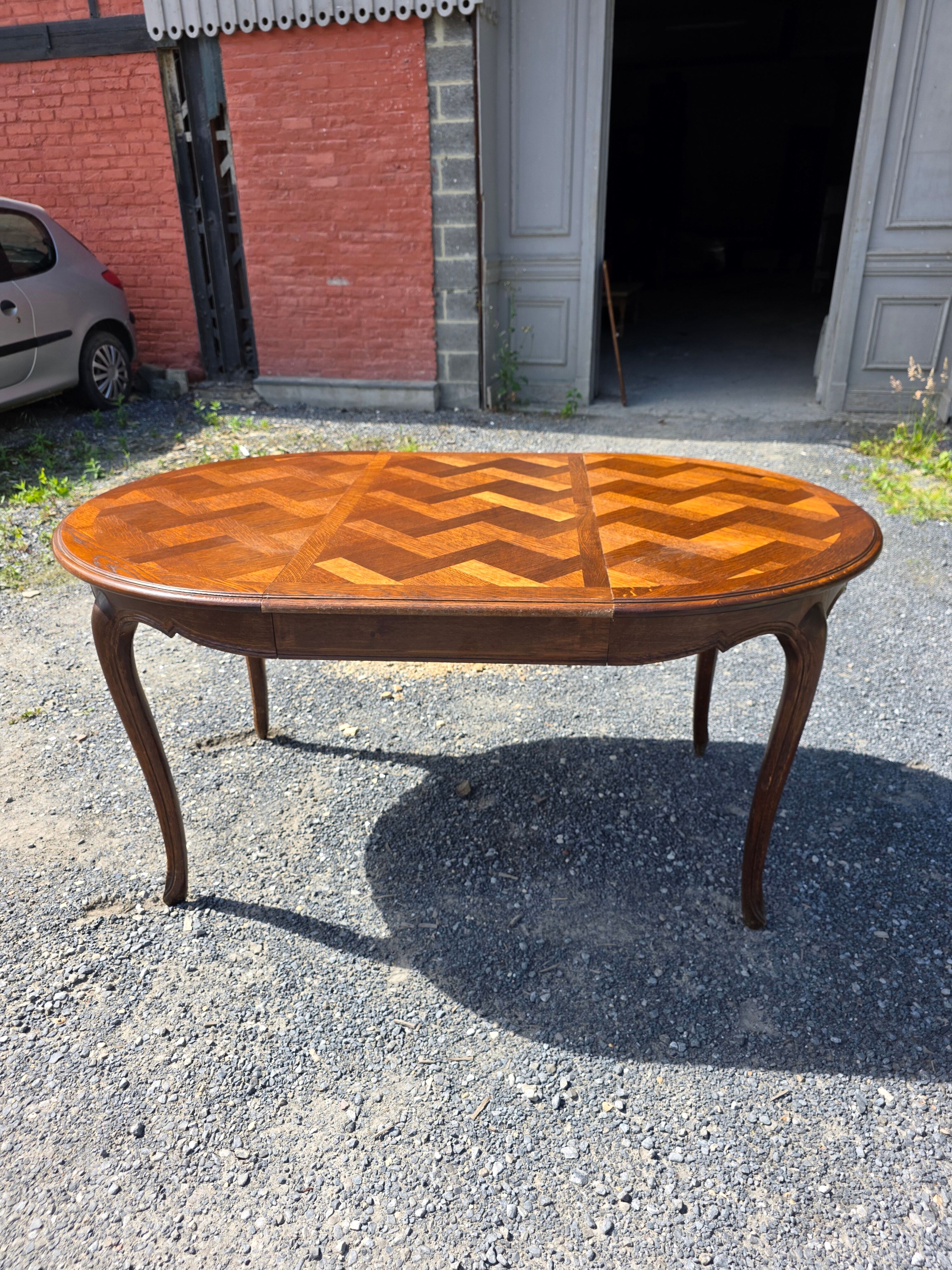Extendable table in Louis XV style in oak (2 extensions)