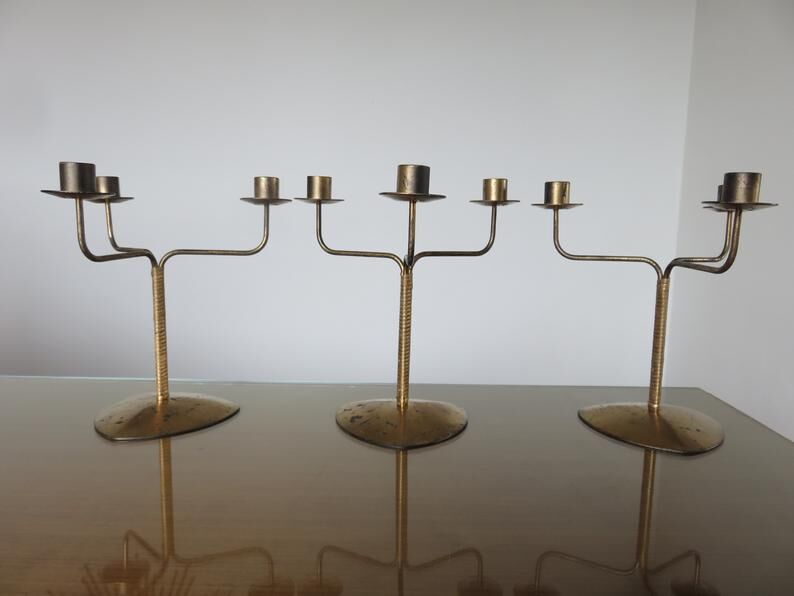 Series of 3 70s gold metal candlesticks