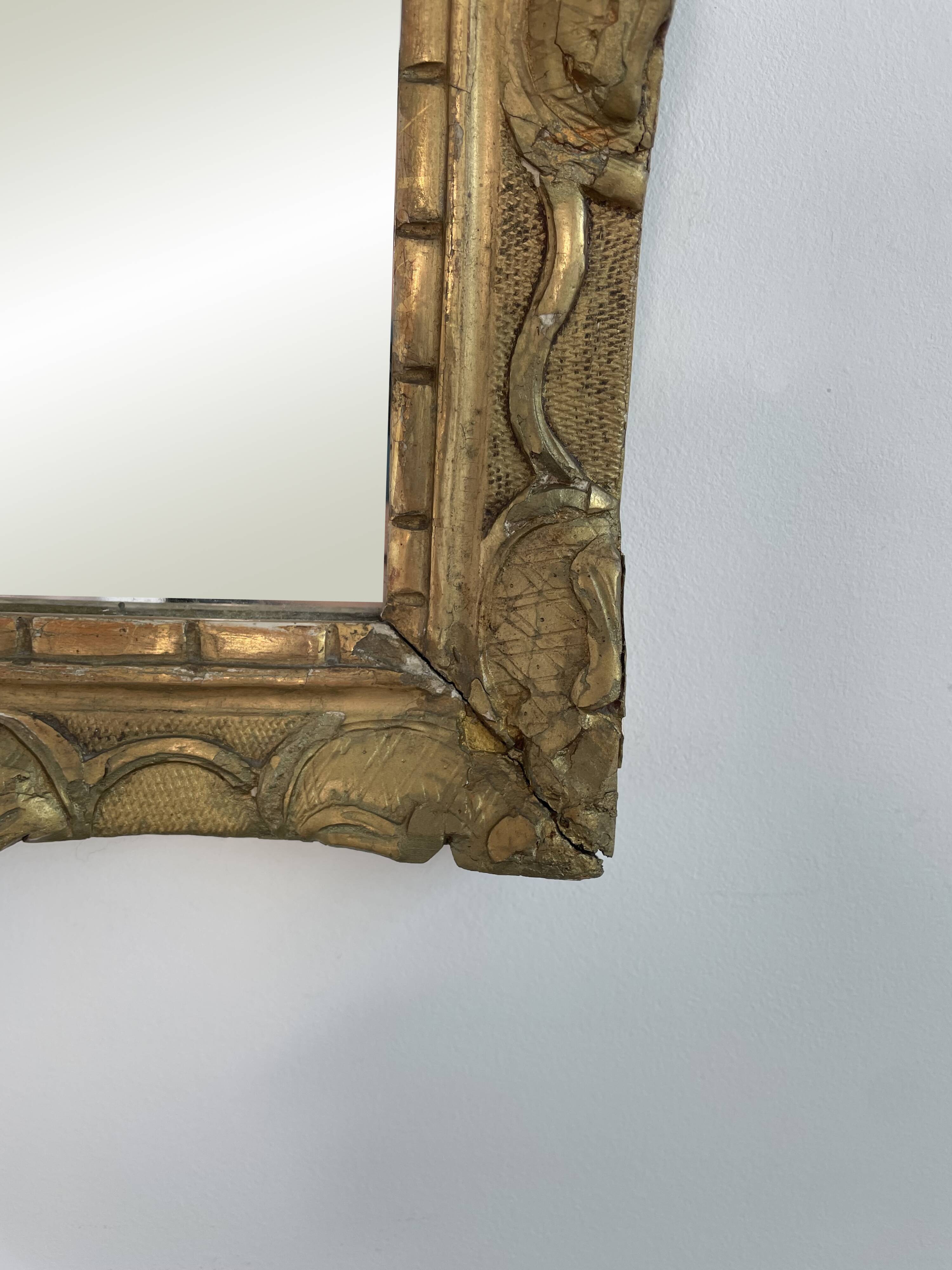 18th century mirror, Louis XVI period, gilded carved wood