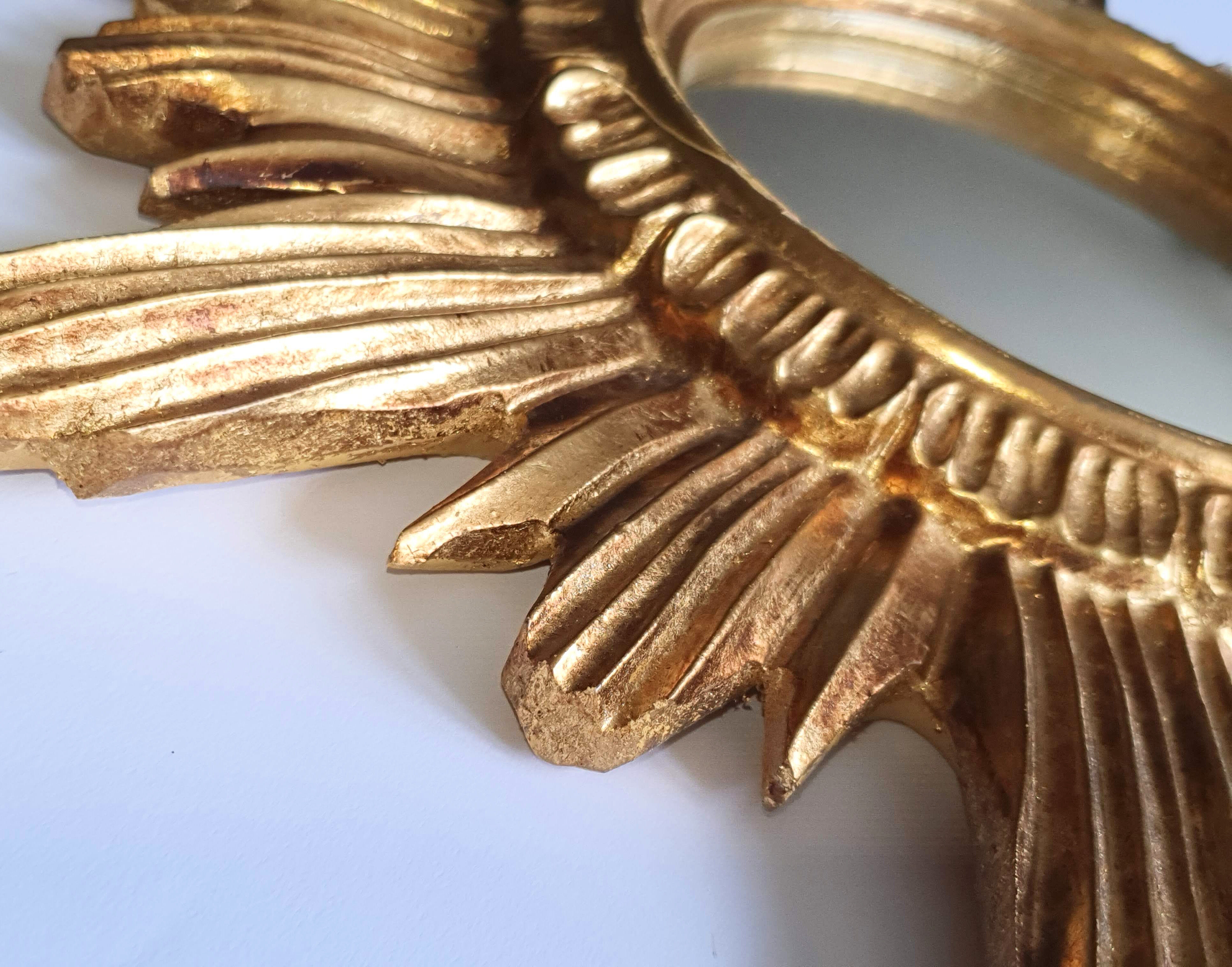 Sun mirror in gilded wood