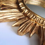 Sun mirror in gilded wood