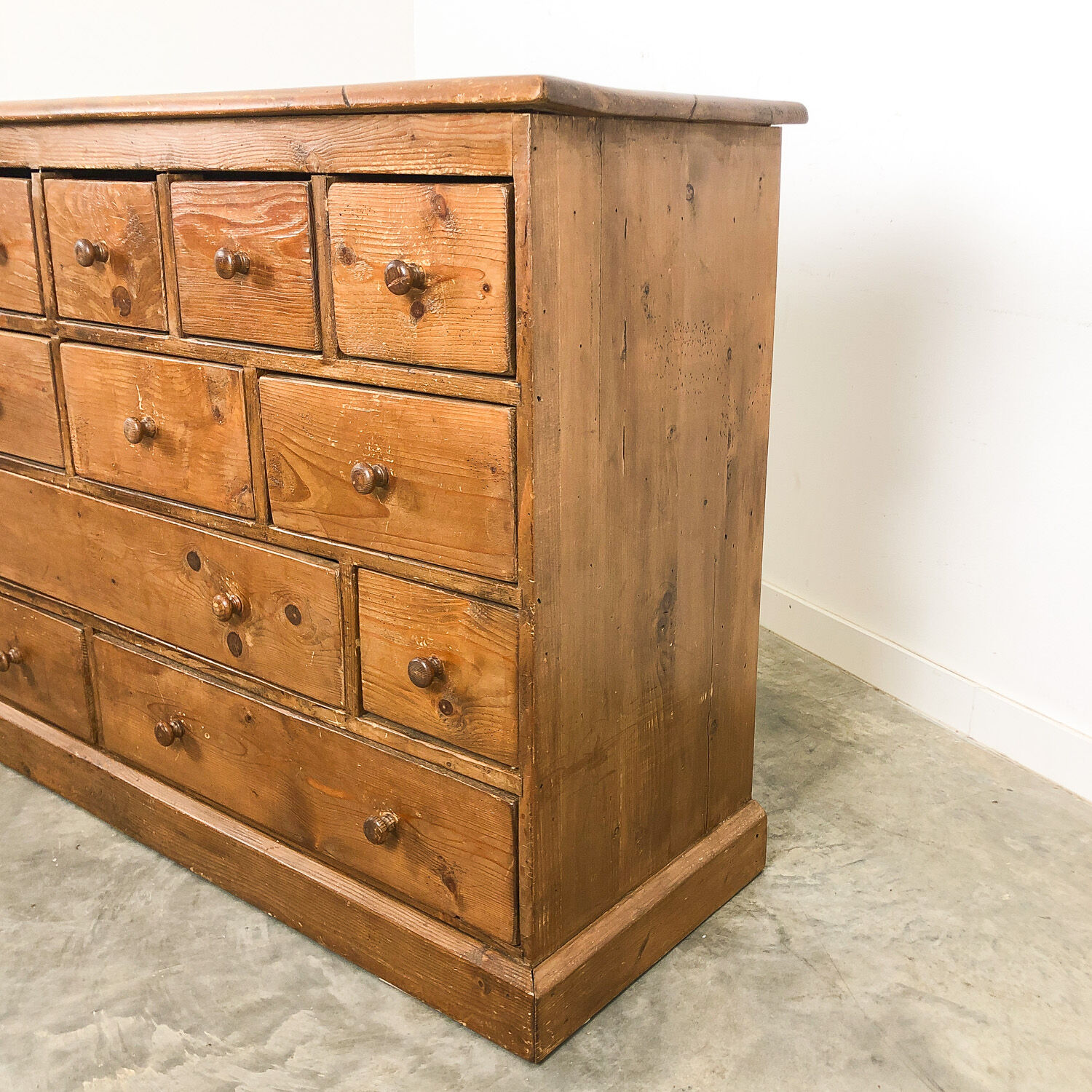 Pine bank of drawers