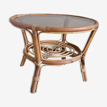 Light rattan lounge table and smoked glass