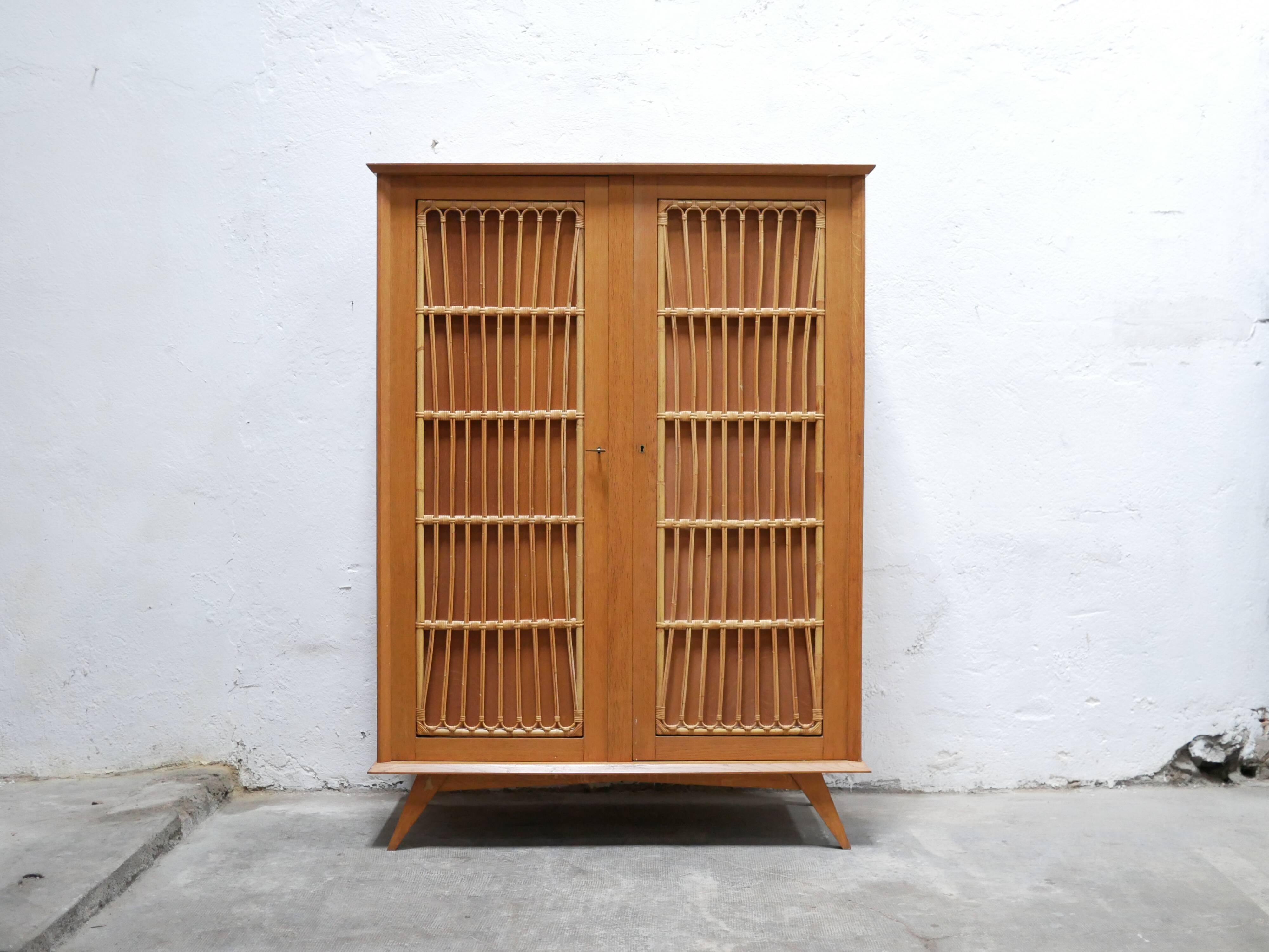 Vintage wardrobe in wood and rattan