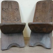 Central Africa circa 1950: pair of exotic wood chairs decorated with crocodile sculptures