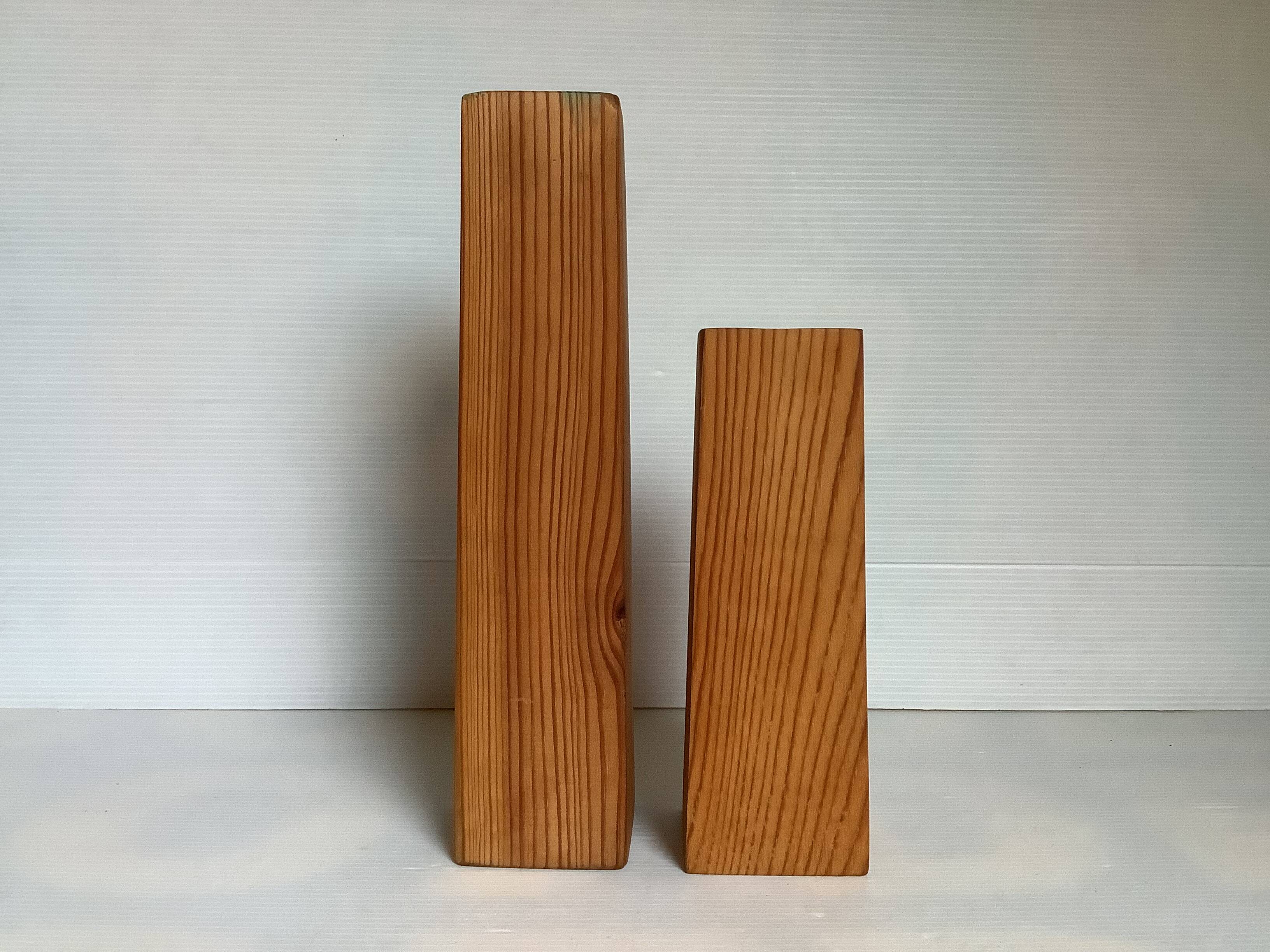 Pair of asymmetrical Scandinavian wooden candlesticks