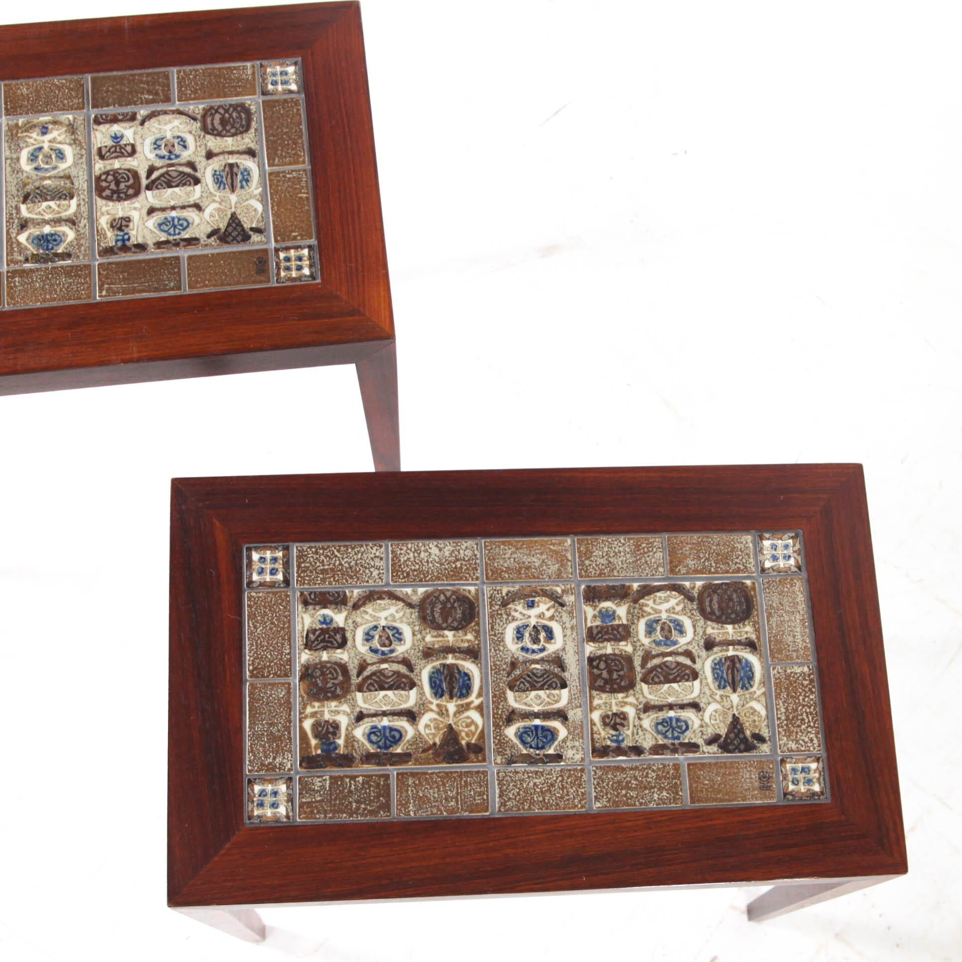 Set of coffee tables in rosewood and ceramic.