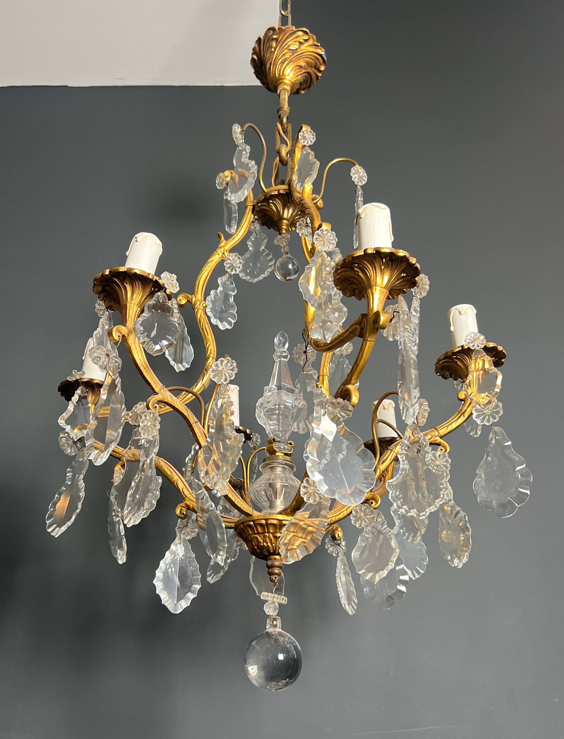 Louis XV style bronze chandelier with crystals and 6 lights