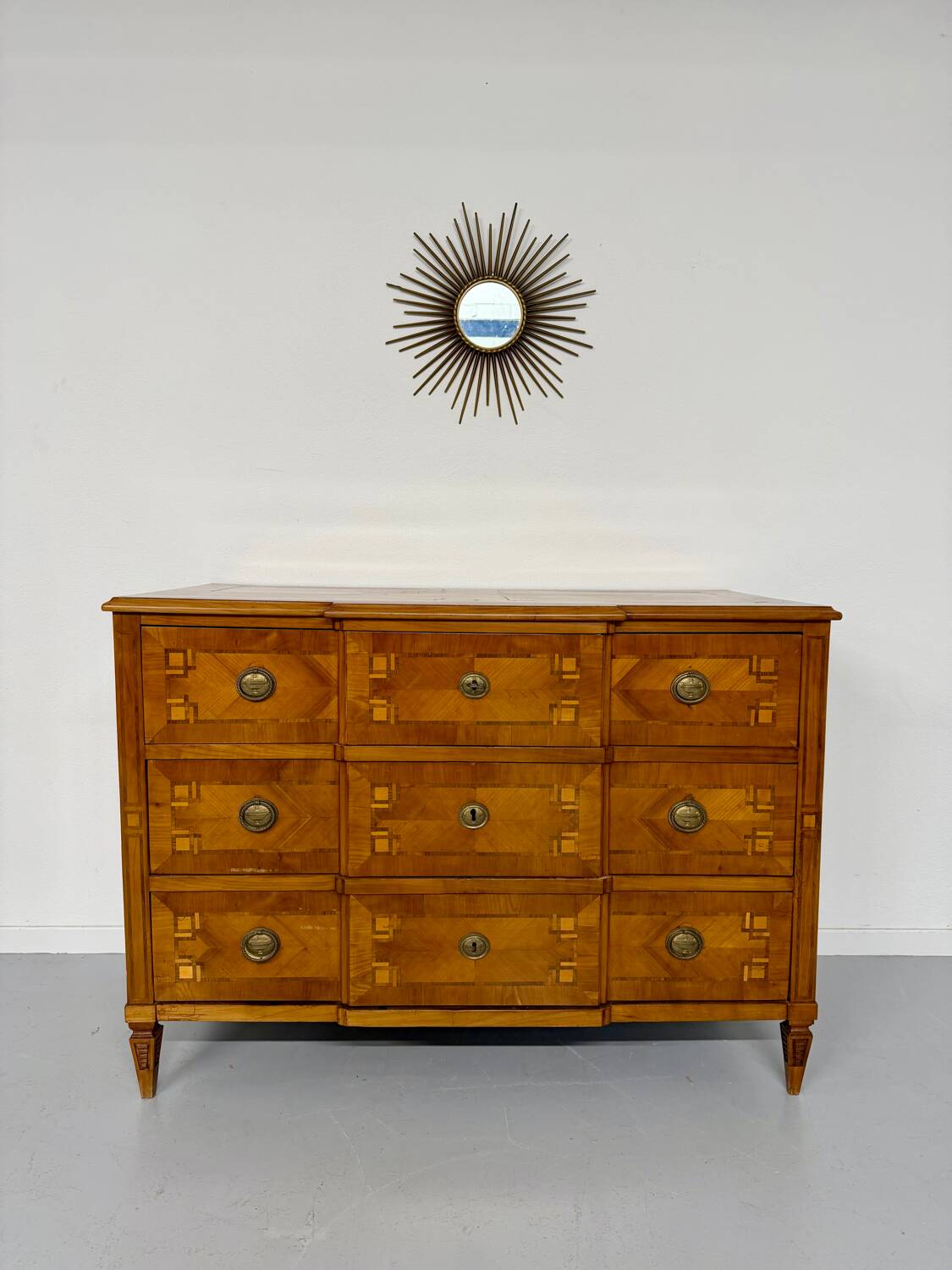 Antique marquetry chest of drawers from the transition period at the end of the 18th century, with 3 wooden drawers.