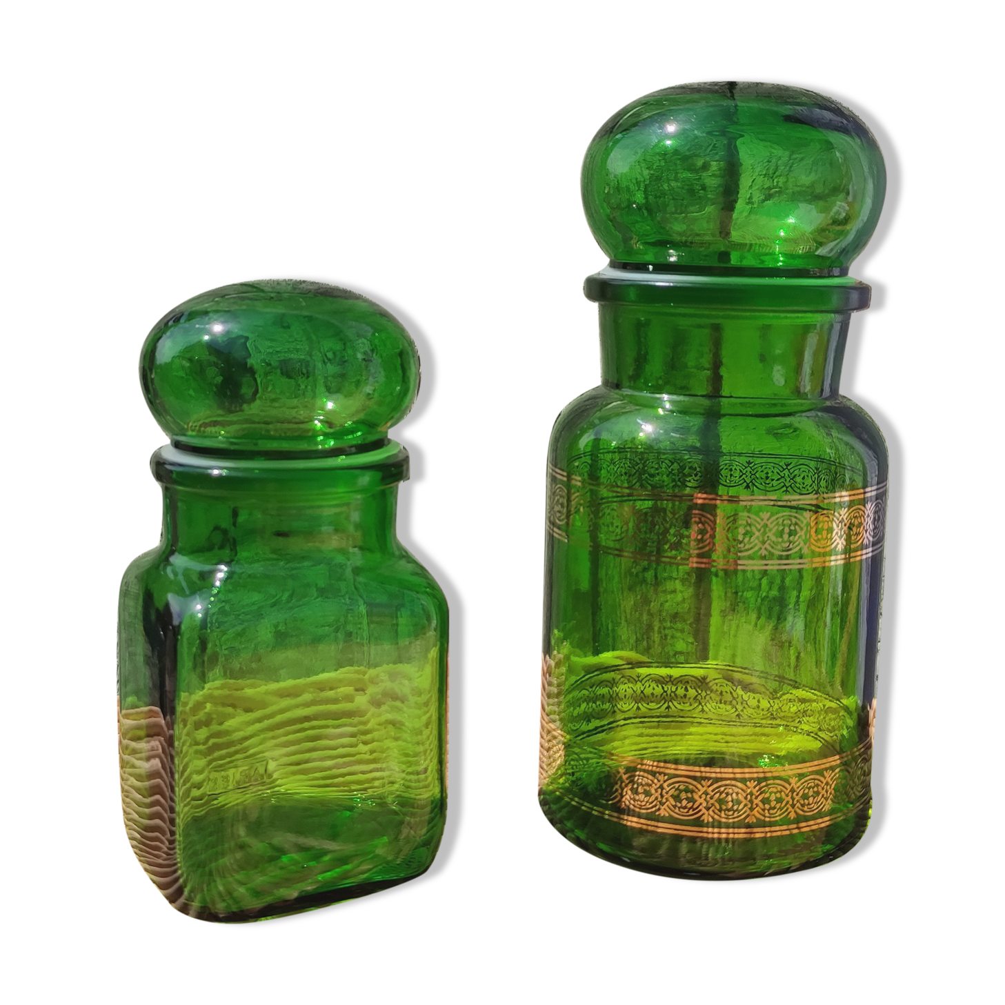 Duo of pots and jars apothecary style in green glass.