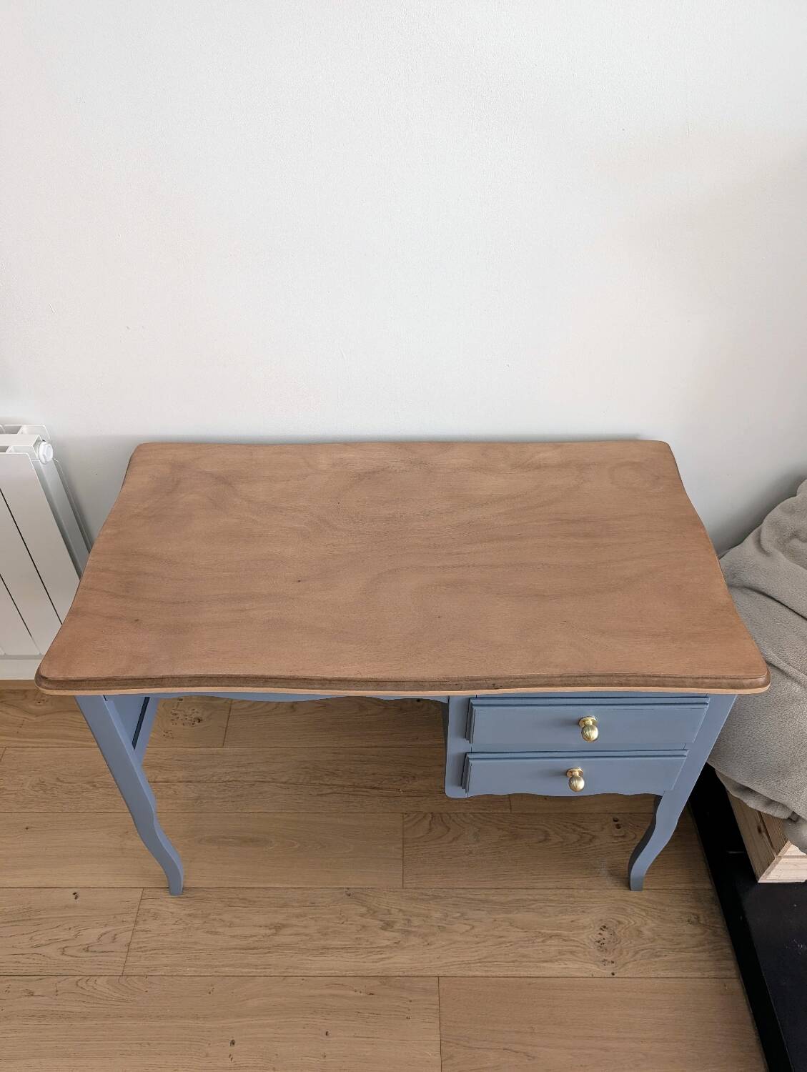 Blue wooden desk ready for its new life.