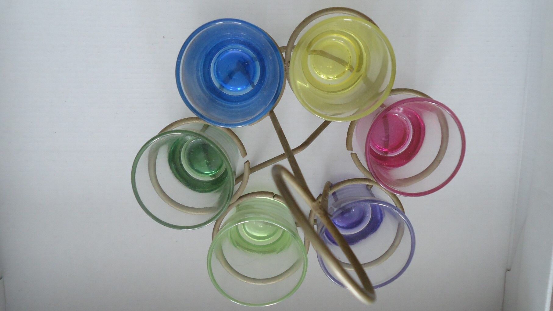 Liqueur glasses on vintage stand