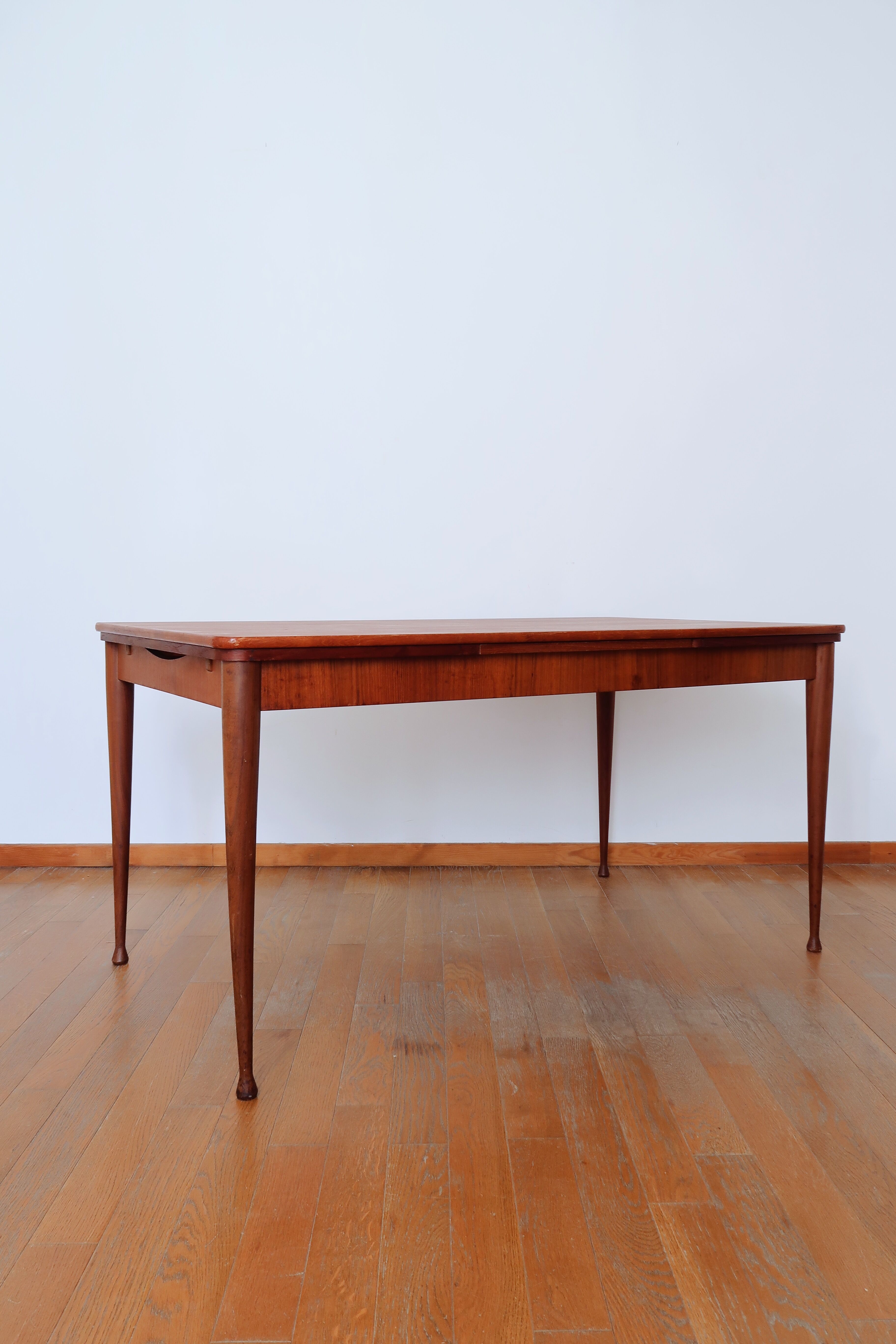 Scandinavian stretch teak table