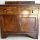 Commode ancienne en loupe de noyer – 1 tiroir et 2 portes