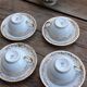 Set of 4 cups and sugar bowl Haute porcelaine de Berry