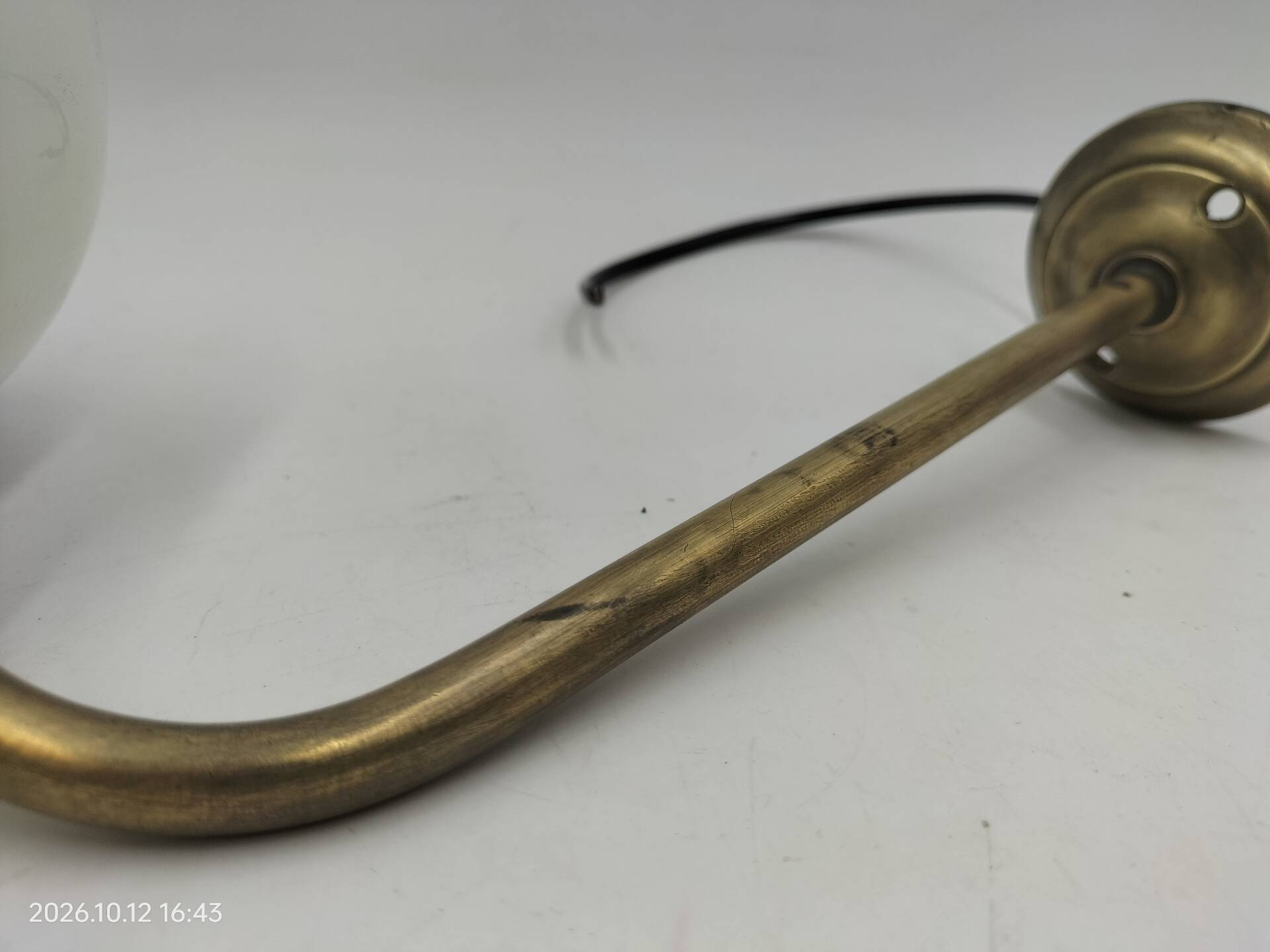 Brass and glass wall light