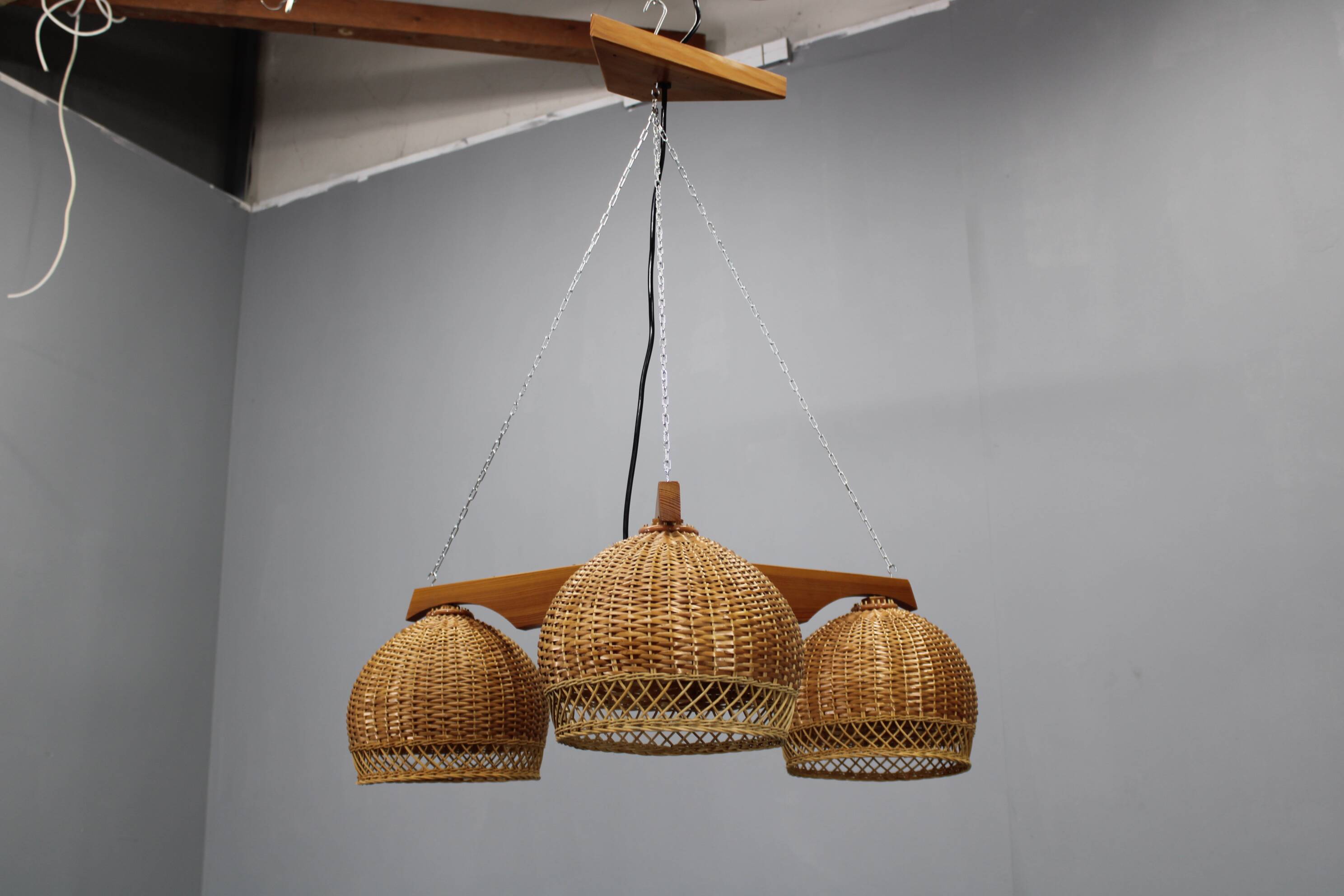 1970s Czechoslovakian rattan & pine pendant light, three-shade chandelier