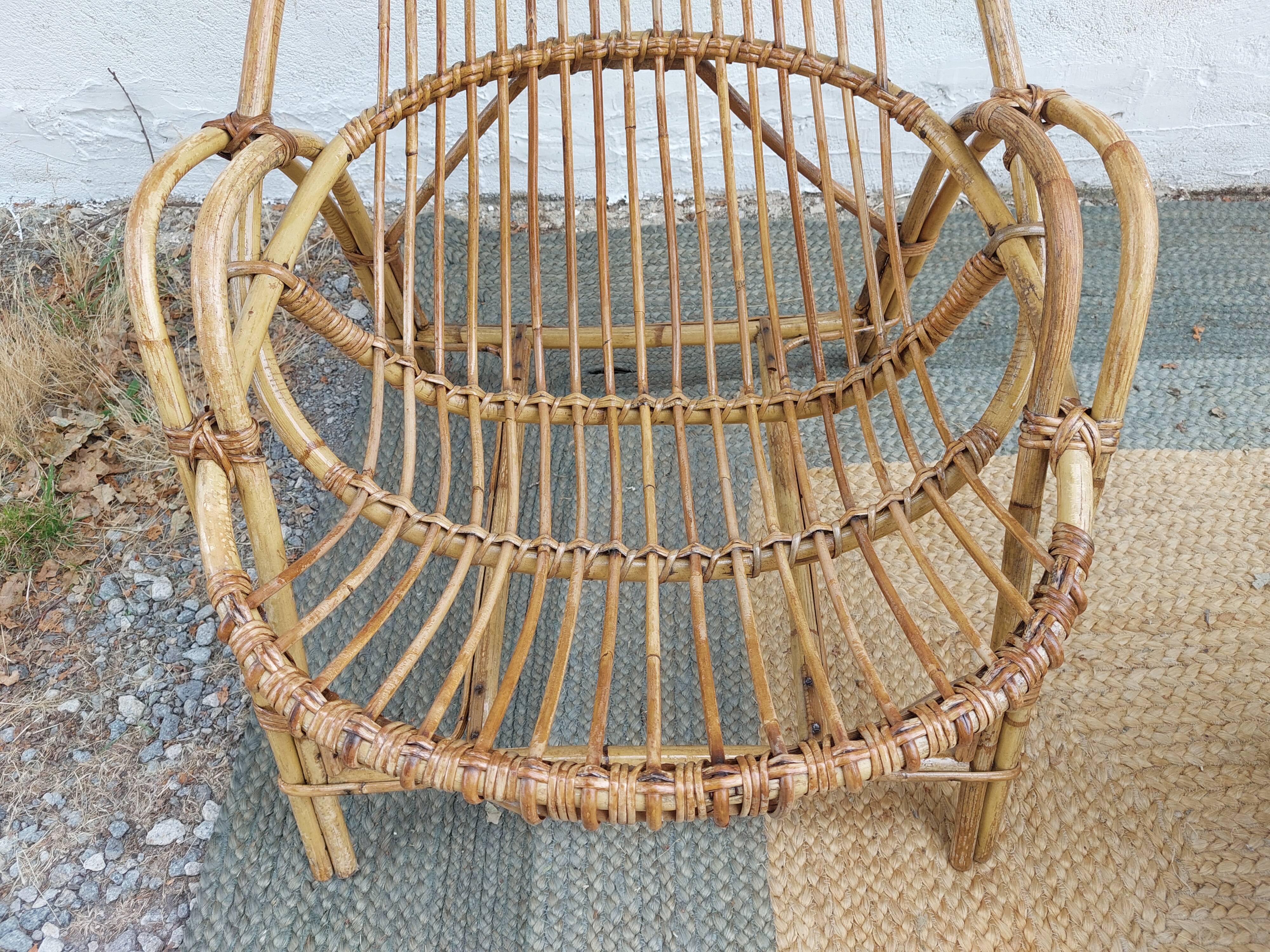 4 armchairs and a coffee table made of rattan and bamboo wood, vintage.