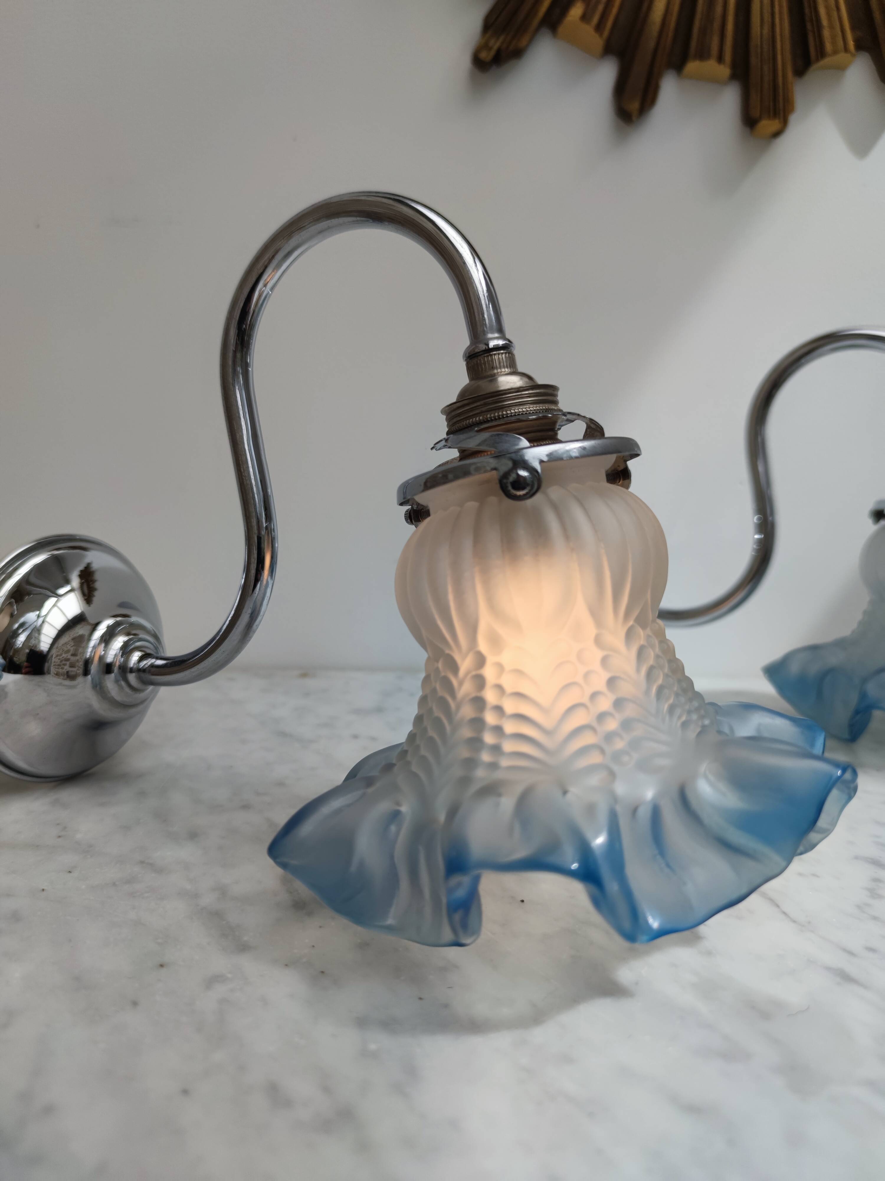 2 blue swan collar sconces