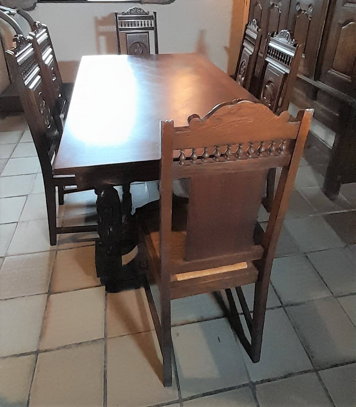Breton dining room table with 2 extensions and 6 chairs with Breton characters